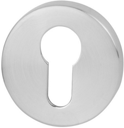 Metalowy wkład zamka w kształcie okręgu z otworem w kształcie klucza.