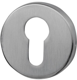 Metalowy zamek w kształcie okręgu z otworem w kształcie klucza.