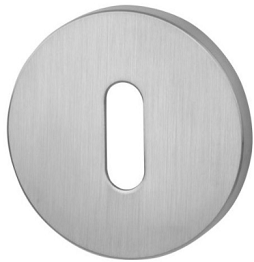 Okrągły, metalowy element z wycięciem w kształcie prostokąta, o matowej powierzchni.