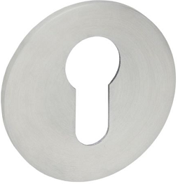 Metalowa osłona zamka w kształcie okręgu z otworem w kształcie klucza.