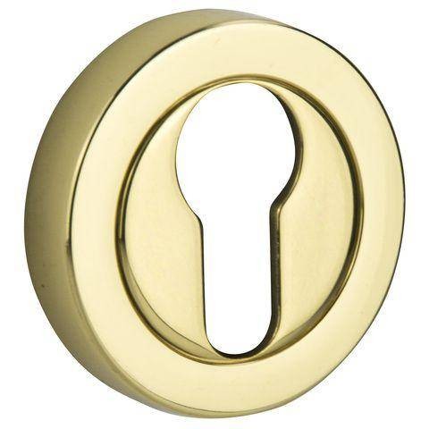 Złoty wkładka zamka w kształcie okręgu z otworem na klucz.