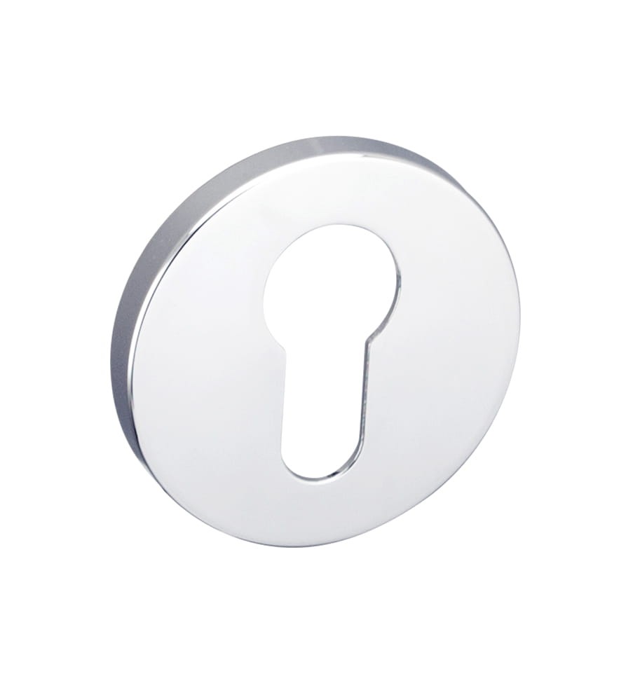 Okrągła, metalowa osłona zamka z otworem w kształcie klucza.