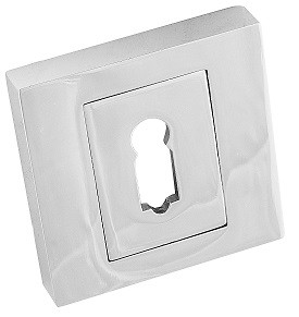 Metalowa wkładka zamka w kształcie prostokąta, z otworem na klucz w centralnej części.