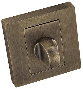 Złoty włącznik światła w kwadratowej ramce z wypukłym pokrętłem.