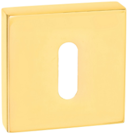 Złota, kwadratowa osłona z otworem w kształcie prostokąta.