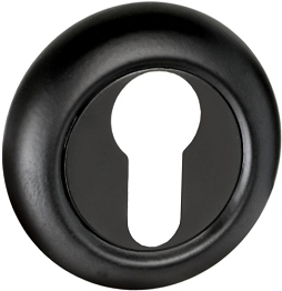 Czarny otwór na klucz w okrągłej obudowie, z widocznym kształtem klucza wewnątrz.