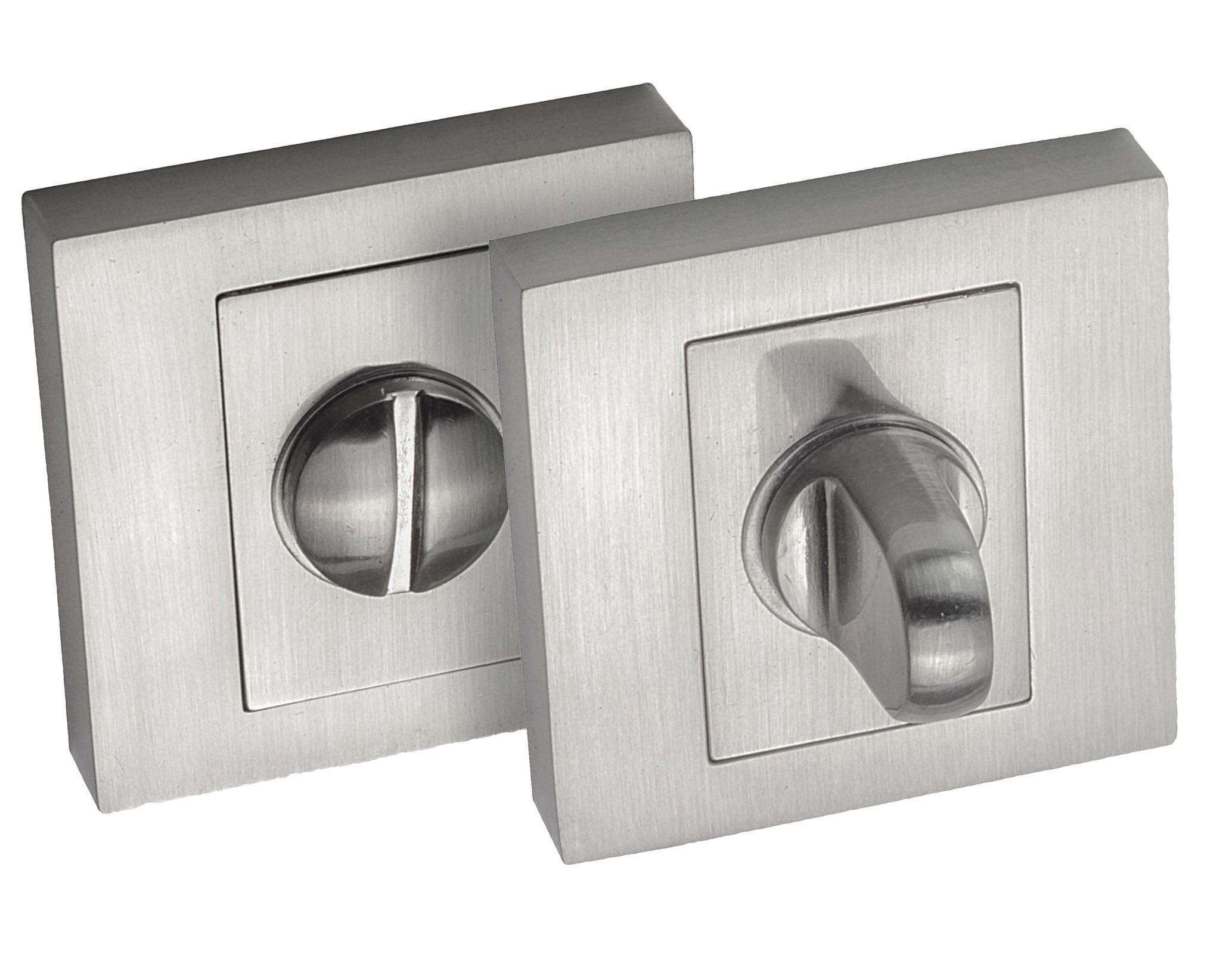 Metalowe przełączniki w kwadratowych ramkach, jeden z pokrętłem, drugi z zamkiem.