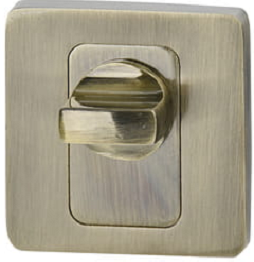 Złoty włącznik światła o kwadratowej ramce i prostym, okrągłym przyciskiem.