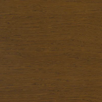 Tekstura drewna w ciepłym brązowym odcieniu z widocznymi słojami.